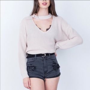Sweater with cut out v-neck